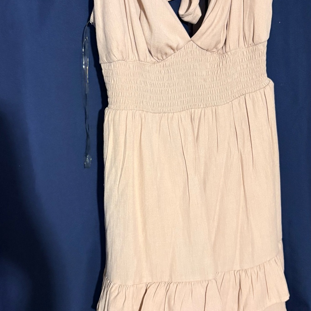 Cream Sleeveless Dress with Ruffle Hem